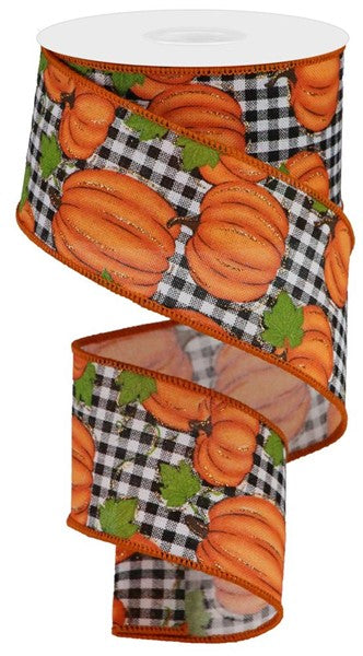 White polyester ribbon with orange pumpkin patch print featuring moss green leaves on a black background.