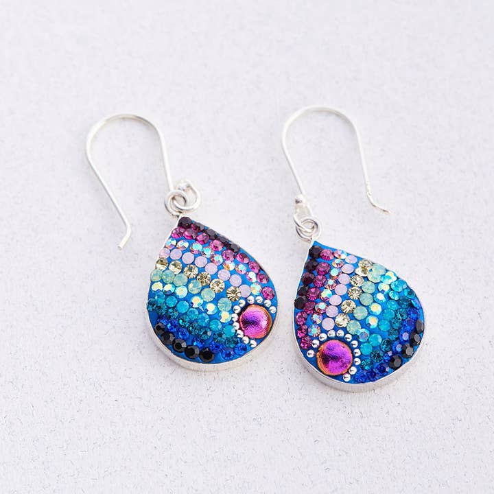 Sterling silver teardrop earrings featuring a mosaic pattern with Austrian crystals in blue and clear tones.