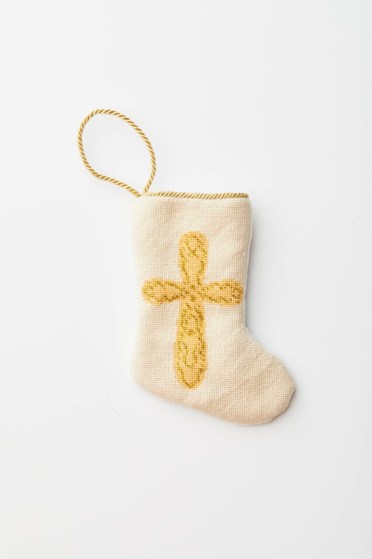 Prince Of Peace Cross Stocking, a hand-stitched needlepoint stocking with a gold cross design.