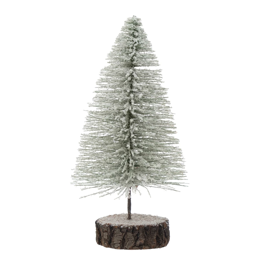 White bottle brush tree with snowy finish on a wooden base