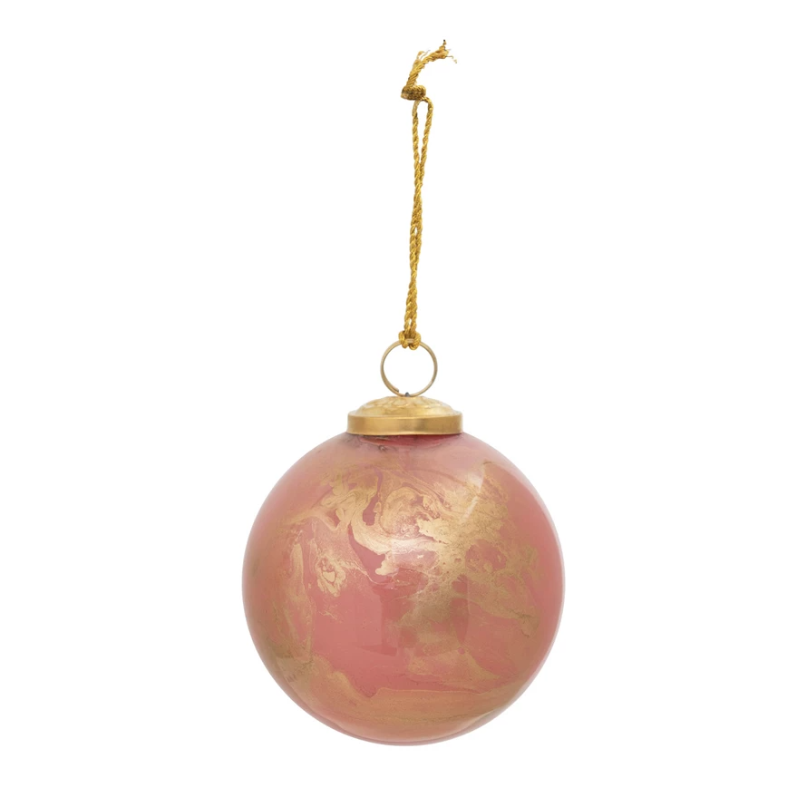 Round glass ornament with marbled pink and gold finish