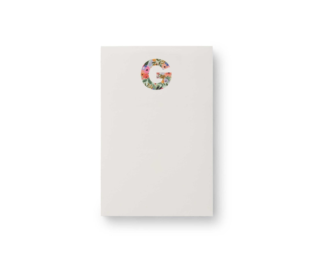 Garden Party monogram notepad with tear-off sheets in a floral botanical pattern.