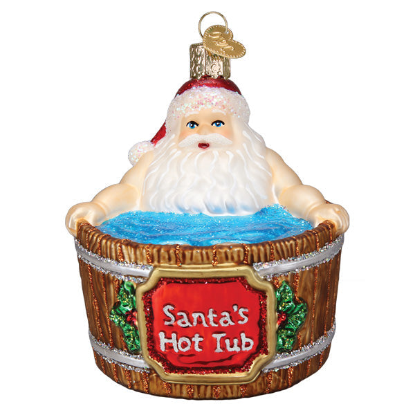 Glass Christmas ornament featuring Santa Claus relaxing in a wooden hot tub with blue water.