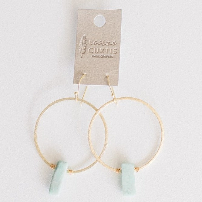 Alexandria Amazonite slab earring featuring a gold setting with an irregular blue-green stone.