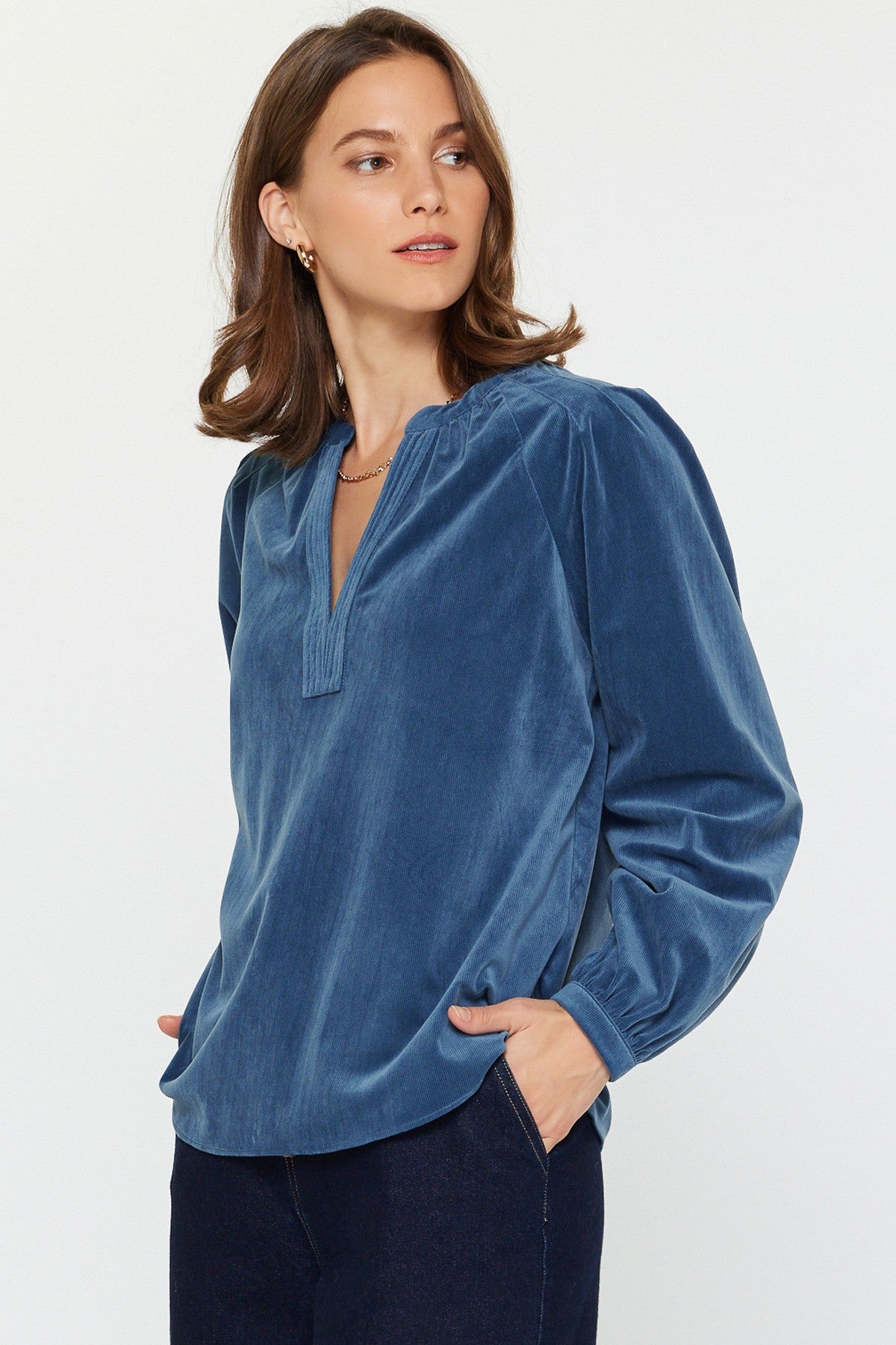 Abigail Fine corduroy long sleeve top in natural tone with split neck placket and shoulder pleats.