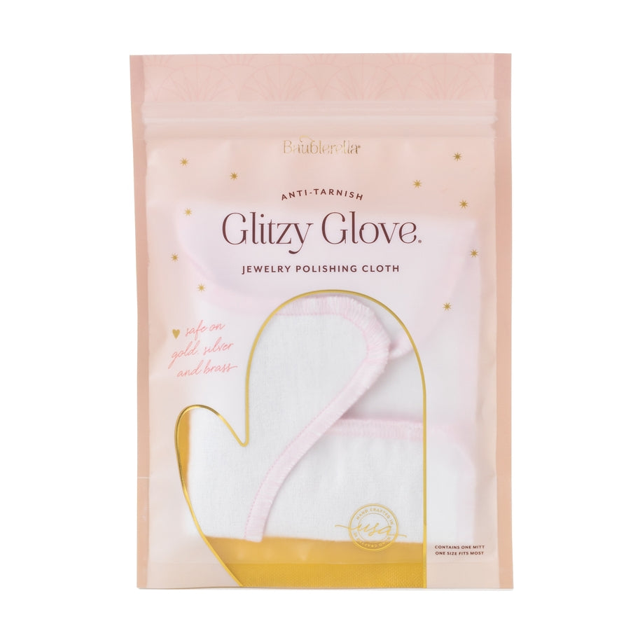 Glitzy Glove Anti-Tarnish Jewelry Polishing Mitt in pink and white packaging.
