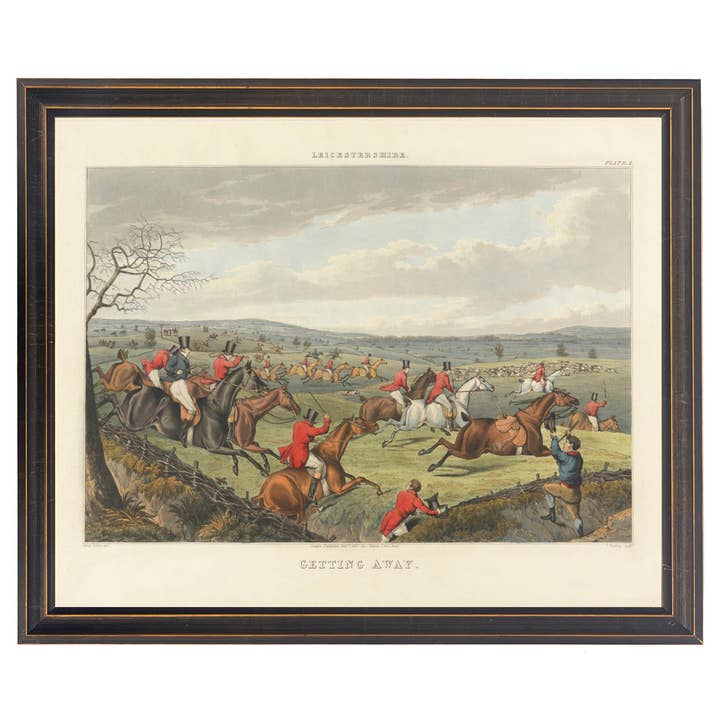 Framed vintage fox hunting print titled 'Getting Away' in a dark wooden frame with gold trim.