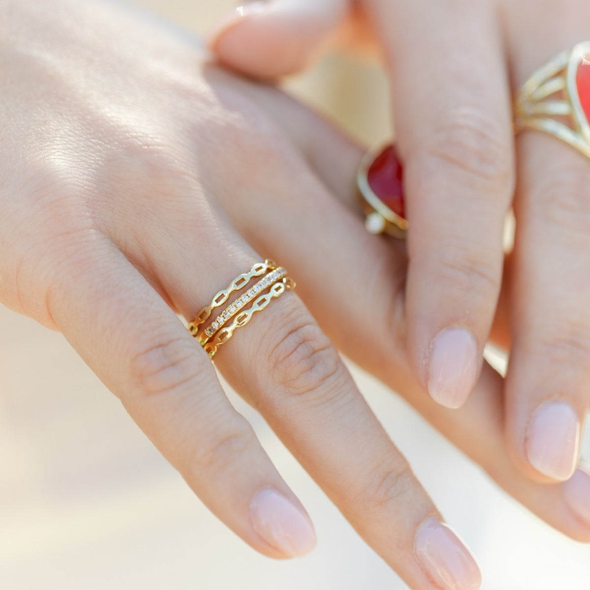 Adjustable Ultra Delicate Pave ring in gold-tone metal with cubic zirconia stones.