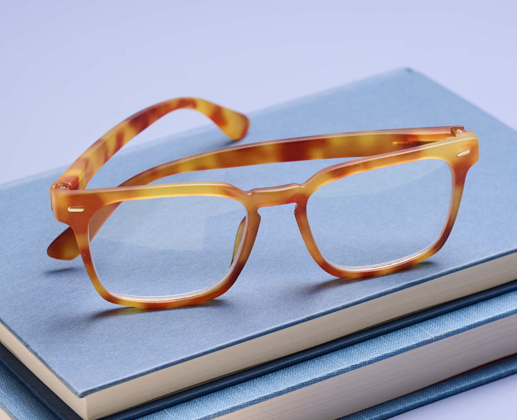 Jude Progressives eyeglasses with polycarbonate frame featuring blue light focus lenses and spring hinges.