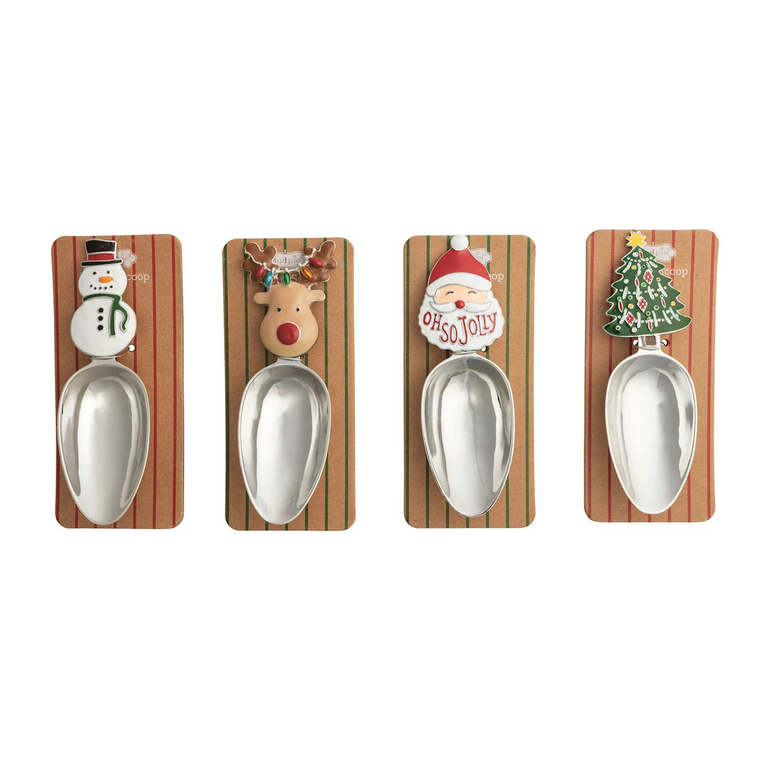 Four stainless steel candy scoops with enamel snowman, reindeer, Santa, and Christmas tree handles.