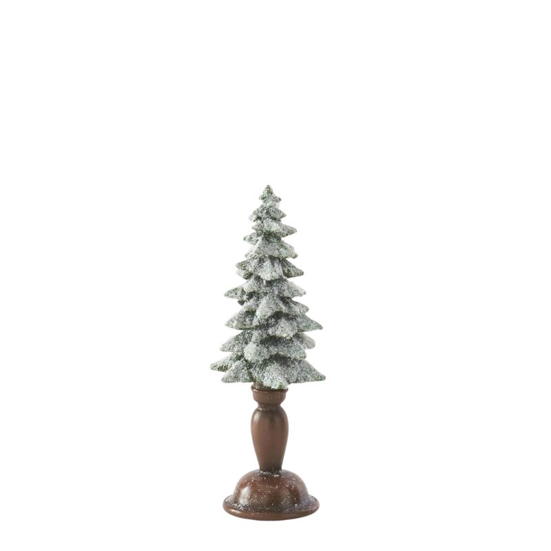 Flocked and glittered resin Christmas tree on a brown pedestal base.