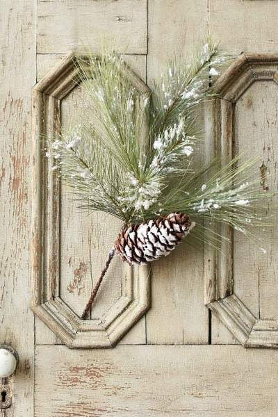 Wish & Wonder Pine Spray featuring large pine cones in greenery with snow dusting and glitter accents.