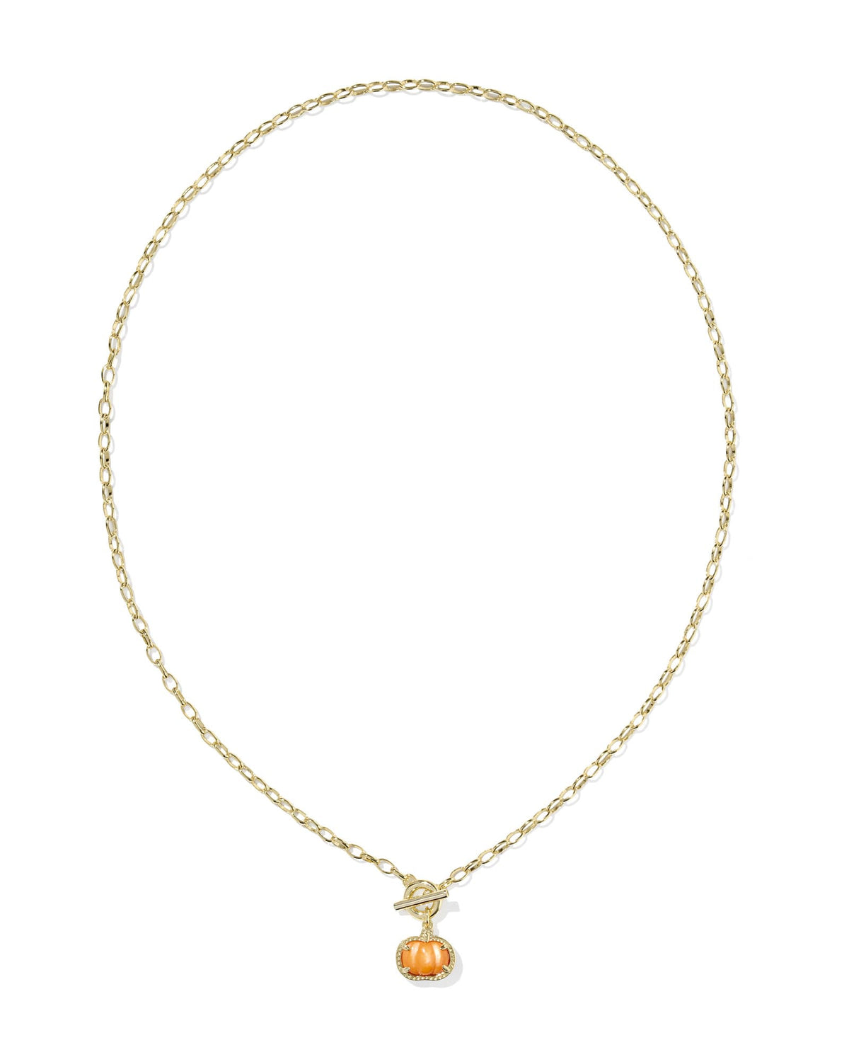 Gold link chain necklace featuring an orange mother-of-pearl pumpkin pendant and toggle closure.