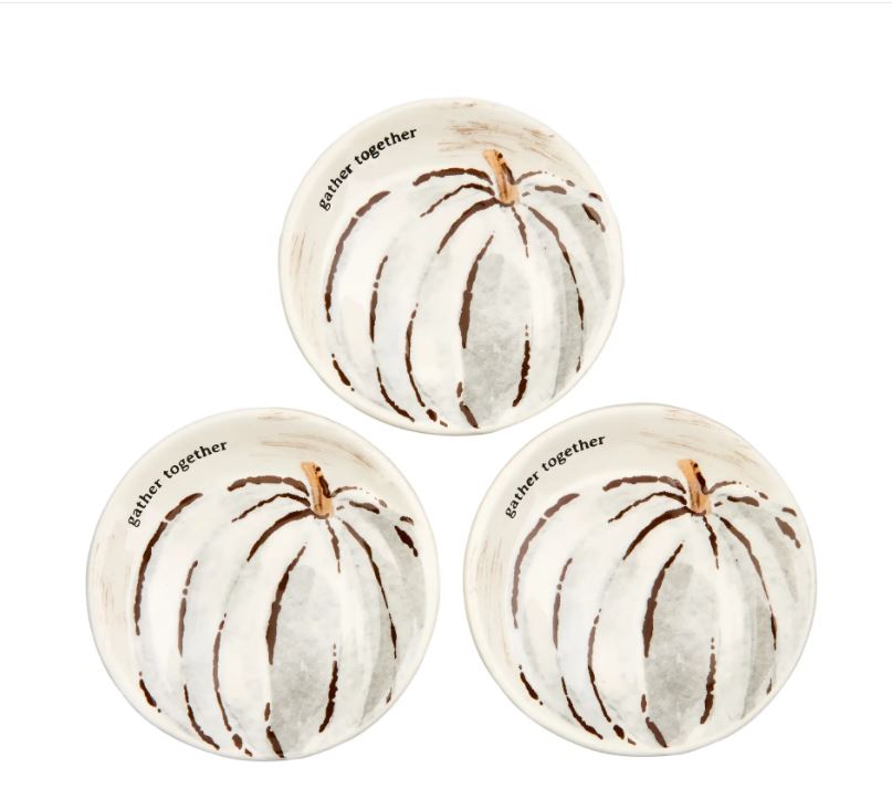 Round dolomite pumpkin dipping dish with a smooth beige finish.