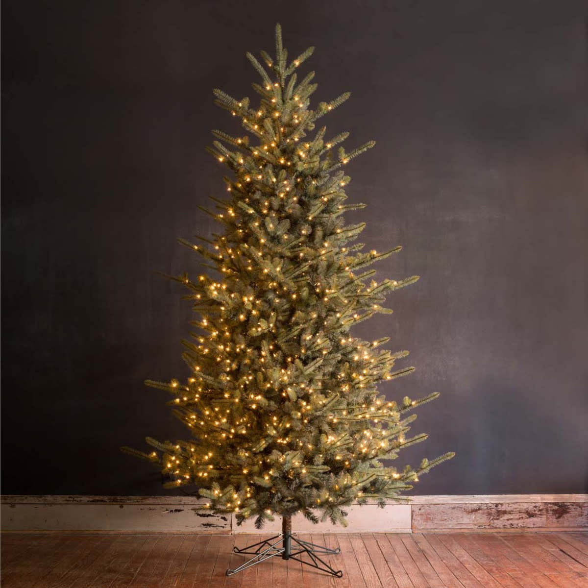 10-foot pre-lit Park Hill Blue Spruce Christmas tree with 1200 clear LED lights.