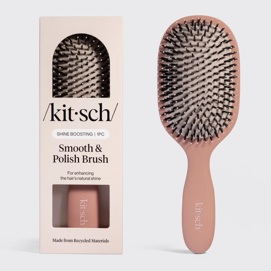 Terracotta smooth brush with dual bristles on a cushioned rubber base
