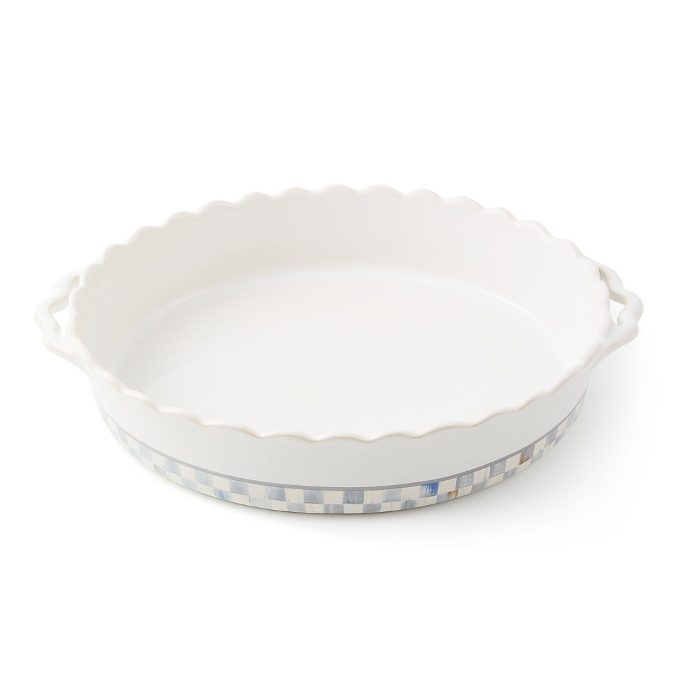 Oval stoneware baker with a handle in natural earth tones.