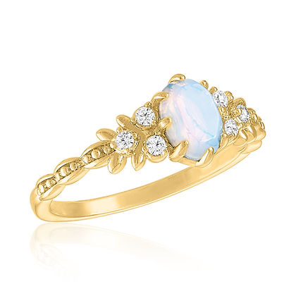 Elegant gold ring featuring a central oval white opal accented by small round diamonds.