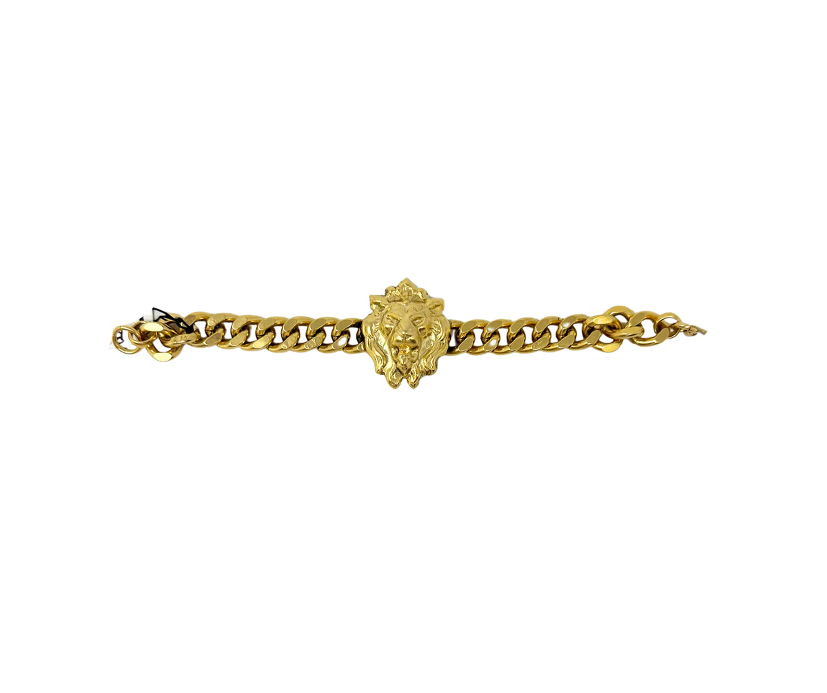 Gold link bracelet featuring a central lion head charm.