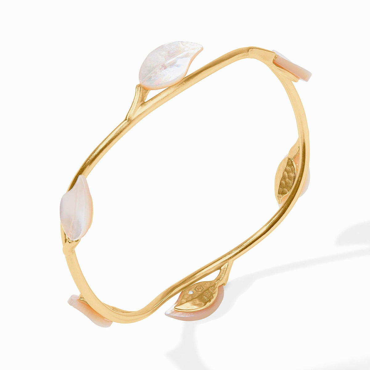 Willow Stone bangle bracelet featuring a smooth oval stone in earthy tones set within a polished silver-toned metal band.