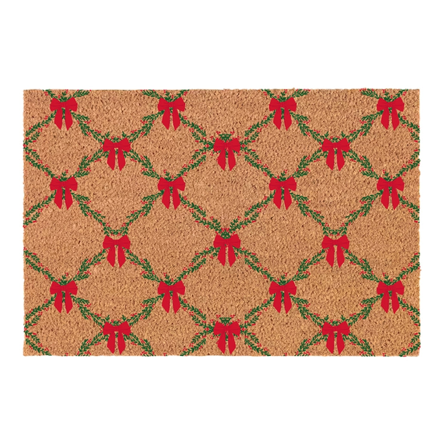Red rectangular door mat with white snowflake patterns on a textured surface.