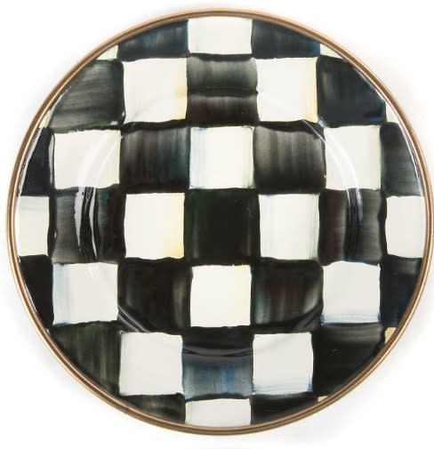 Round steel appetizer plate with Courtly Check blue-and-white pattern on a bronzed stainless rim.