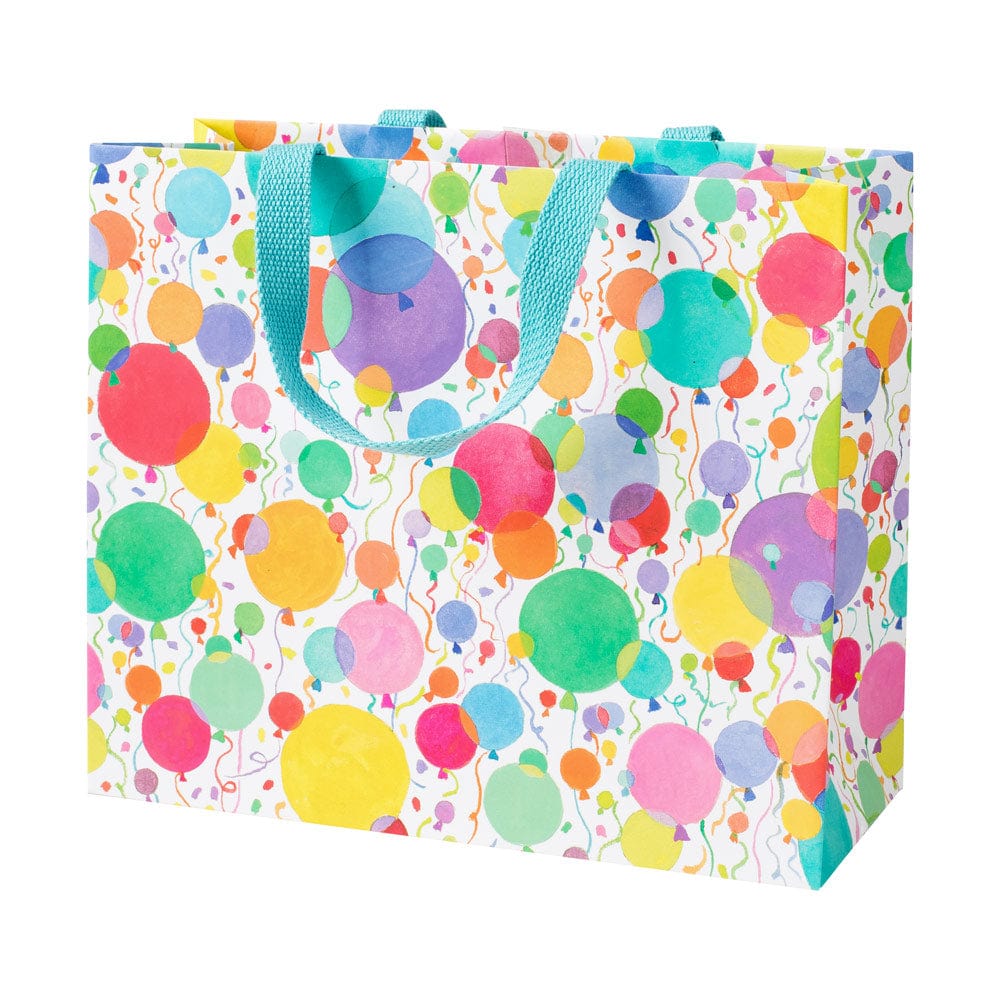 Large horizontal gift bag with printed balloons and confetti pattern on durable paper.