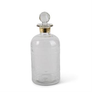 Clear glass decanter with gold rim trim