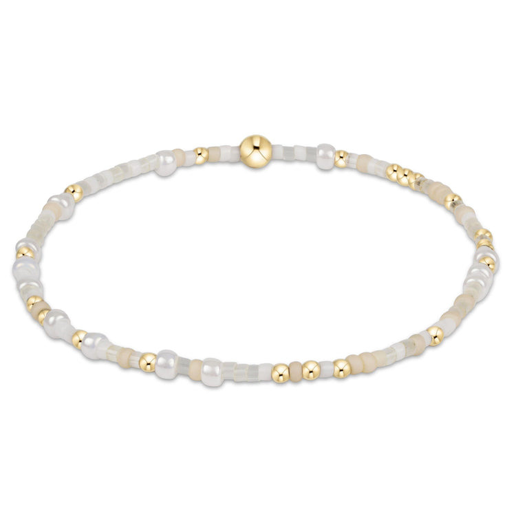 Egirl Hope Unwritten bracelet with gold-filled beads and colorful seed beads on elastic cord