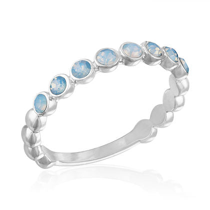 Opalescence Infinity Stack Ring featuring a luminous opalescent stone in an elegant infinity band design