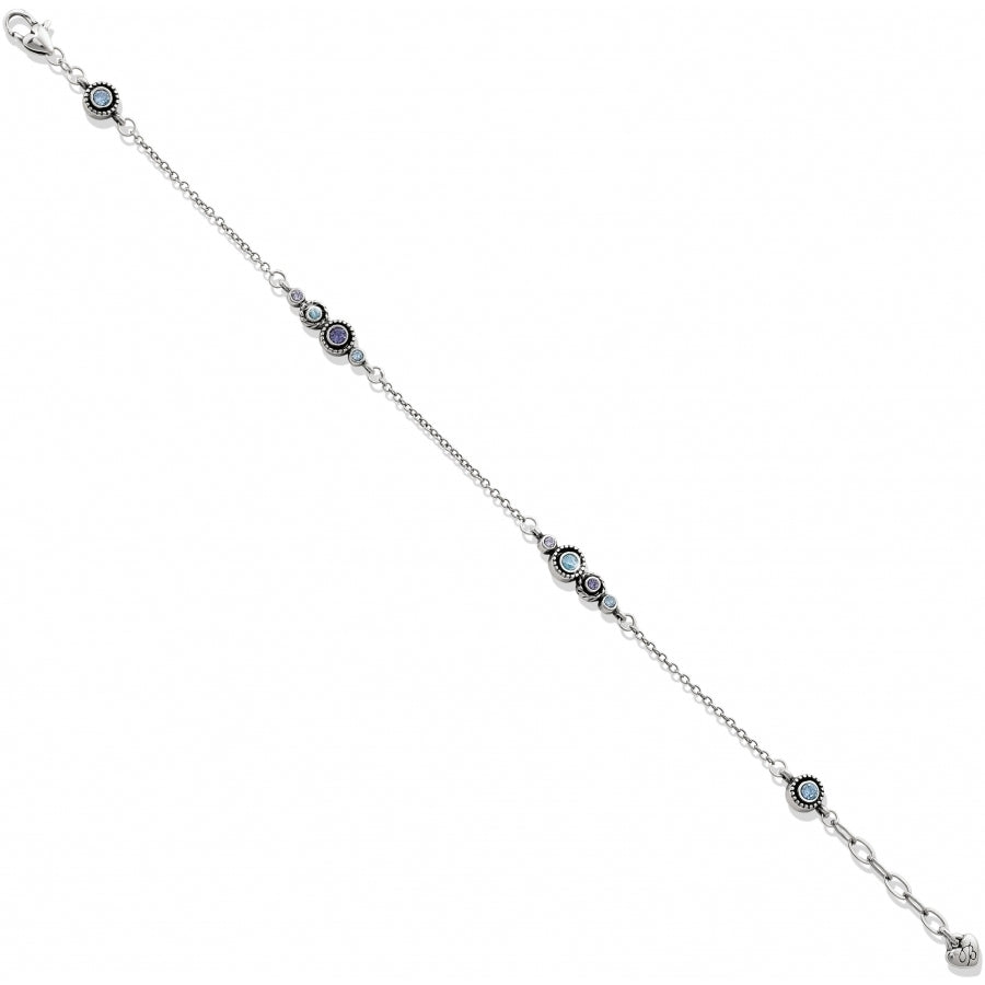 Silver-plated Halo Collection anklet with blue and tanzanite crystals on a silver chain.