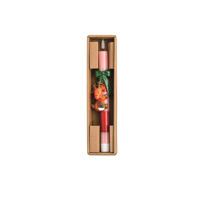 Flameless pink and red taper candle with a reindeer hugger and green bow in a gift box.