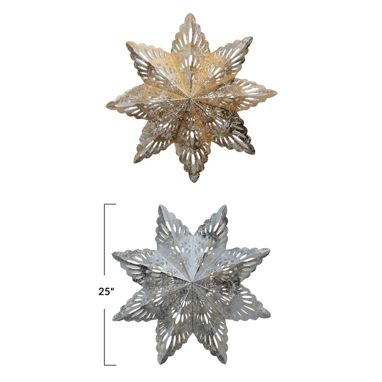 White paper snowflake ornament with attached LED light string.
