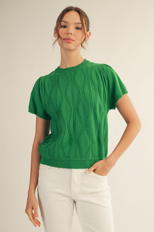 Miranda Wave lightweight sweater top in viscose blend with subtle wave pattern and relaxed silhouette.