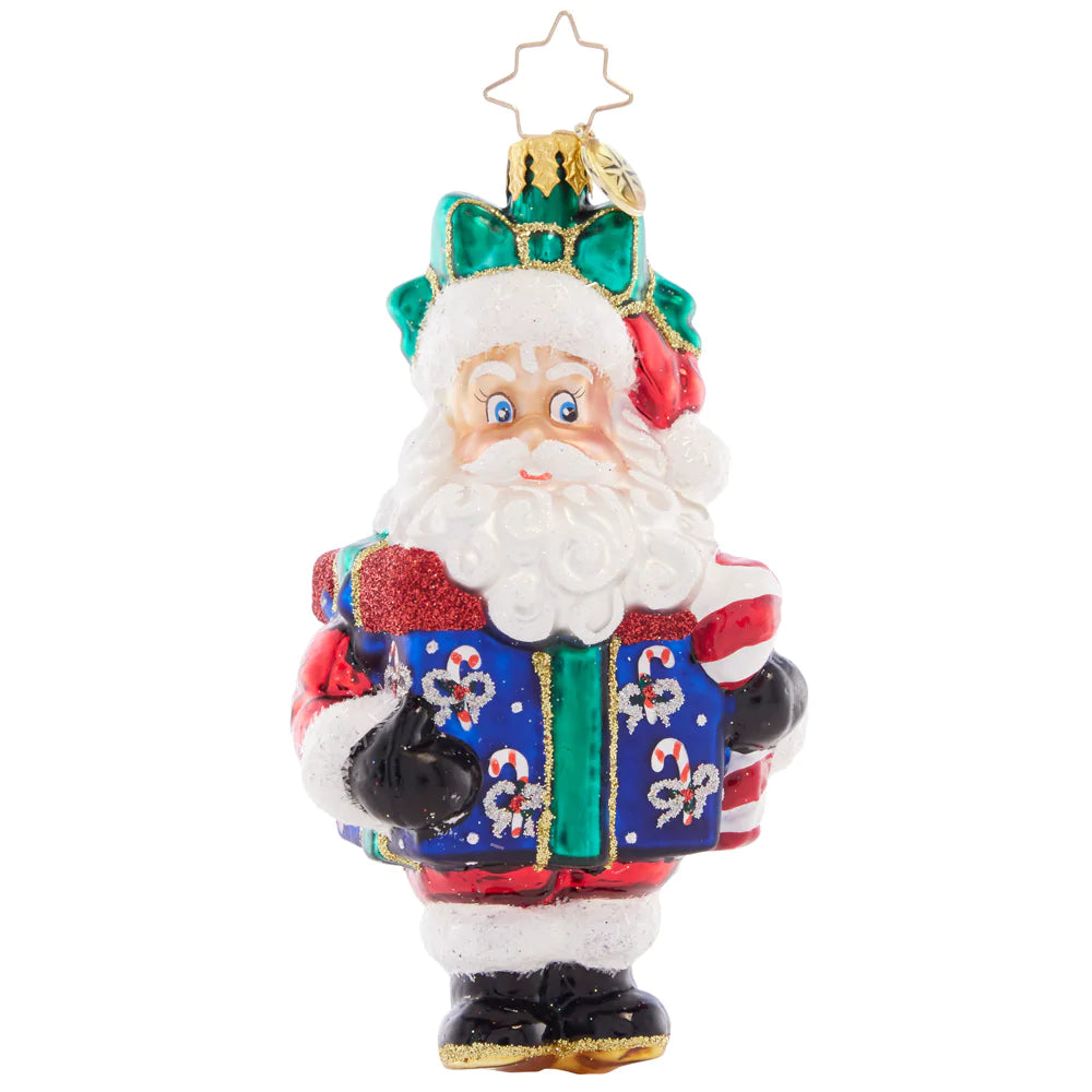 Glass Santa ornament with a blue jacket, red trim, and candy cane gifts.