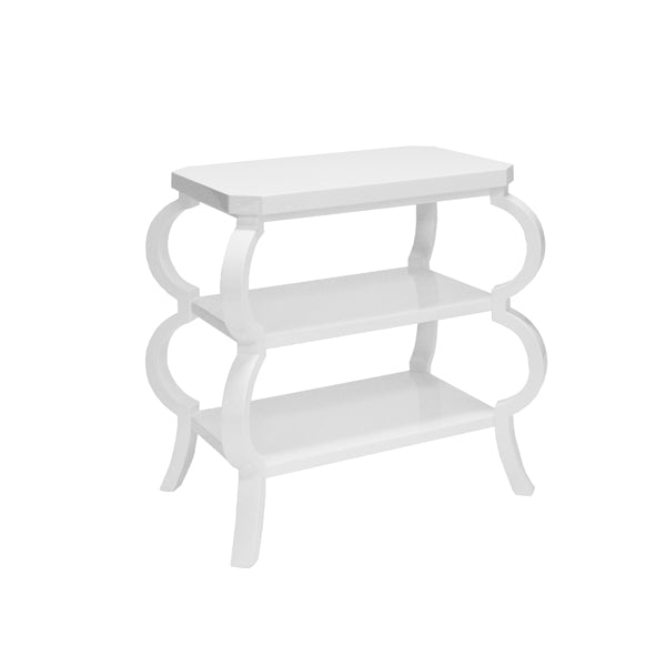 White three-tier side table with quatrefoil-shaped legs and a rectangular top.