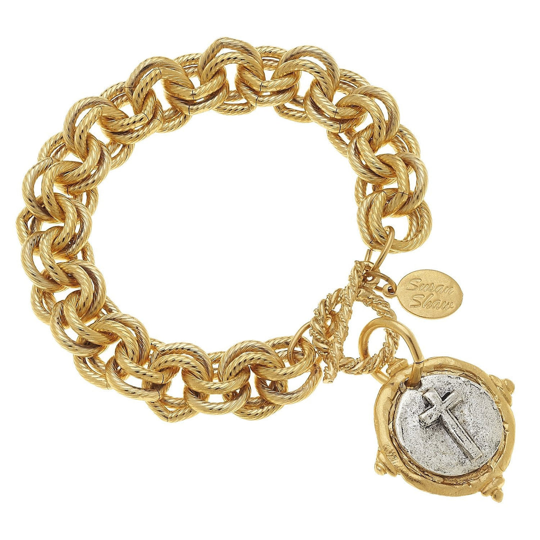 Mixed metal gold-tone chunky chain toggle bracelet with a silver-tone cross coin charm.