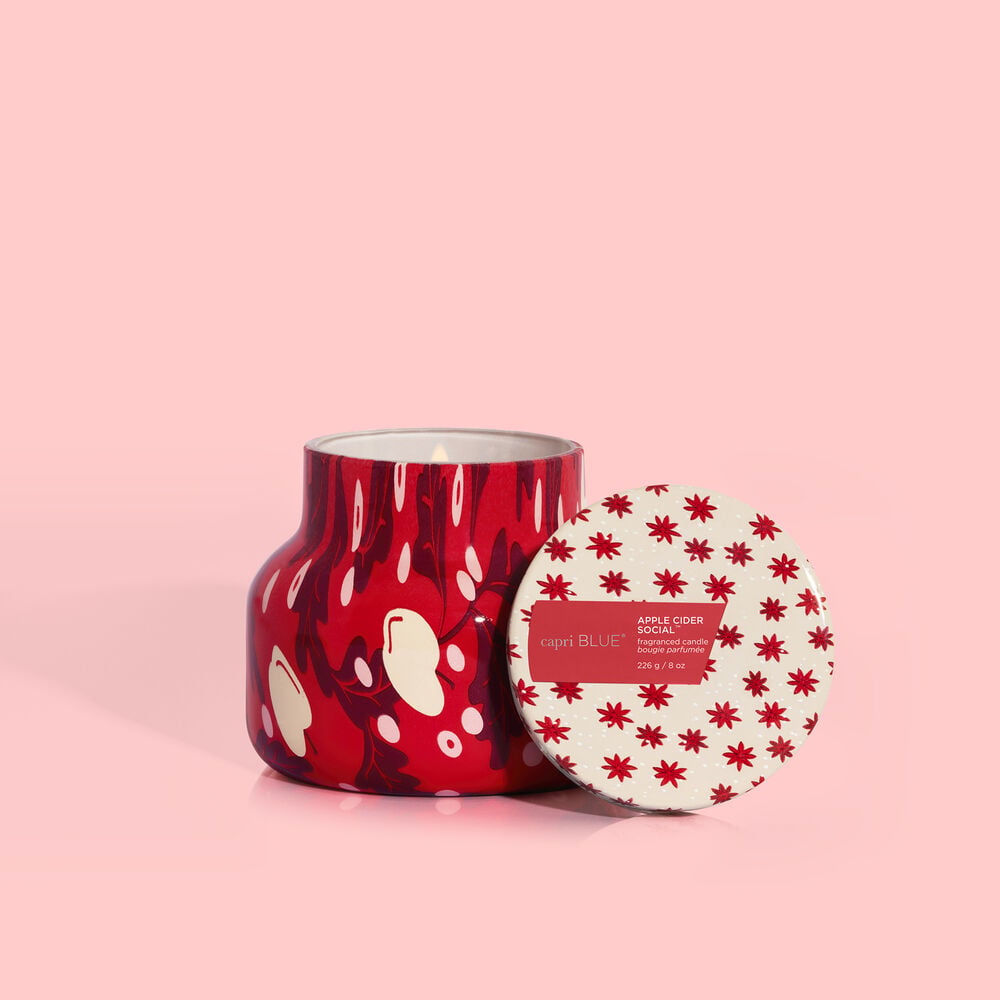 Petite glass jar candle in apple cider social holiday pattern with up to 40 hour burn time