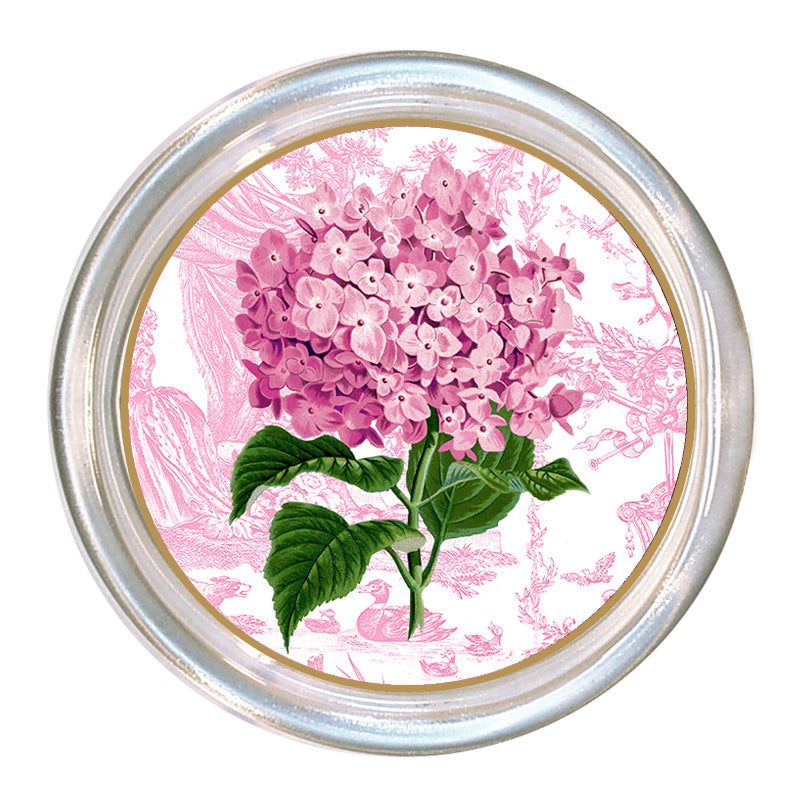 Glass coaster with a high rim to prevent spills and black velvet backing.