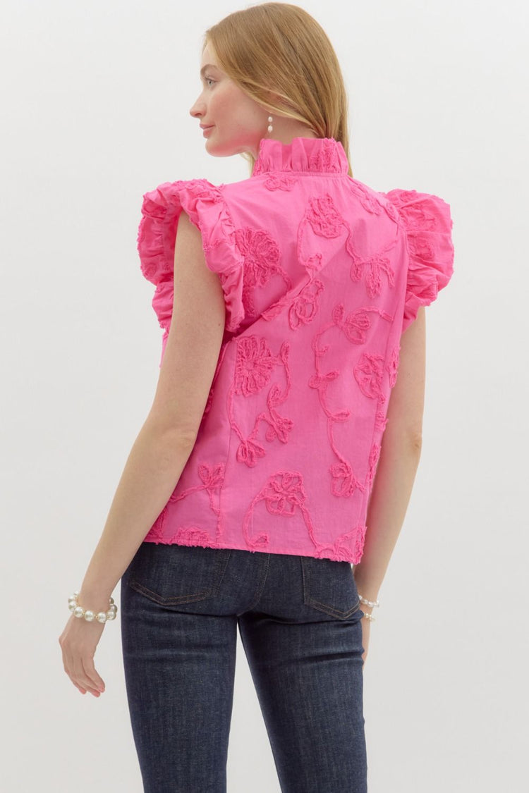 Addison top in solid cotton with floral appliqué, bubble flutter sleeves, lined silhouette.