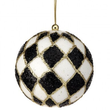 4-inch harlequin glitter ball ornament with black and white diamond pattern and gold accents.