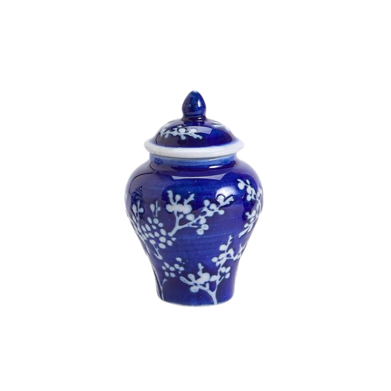 Mini blue and white ginger jar with a floral cherry blossom pattern and matching lid.