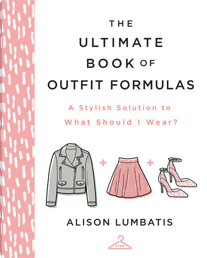 Hardcover book titled The Ultimate Book of Outfit Formulas with a white cover and gold foil lettering.