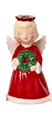 Hand-painted ceramic Christmas angel candleholder in a red dress holding a green wreath.