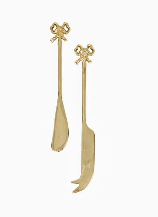 Set of two bow-shaped cheese knives with a brushed aluminum finish on backer card.