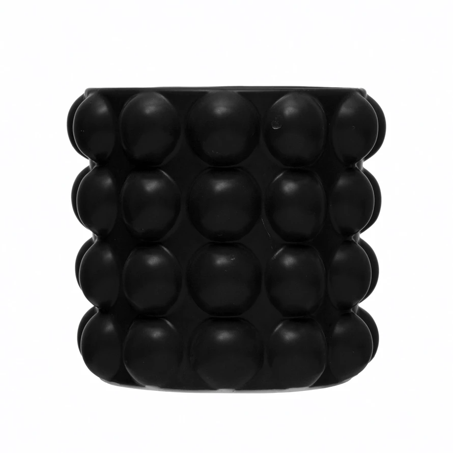 Stoneware planter with raised dot texture in neutral tone