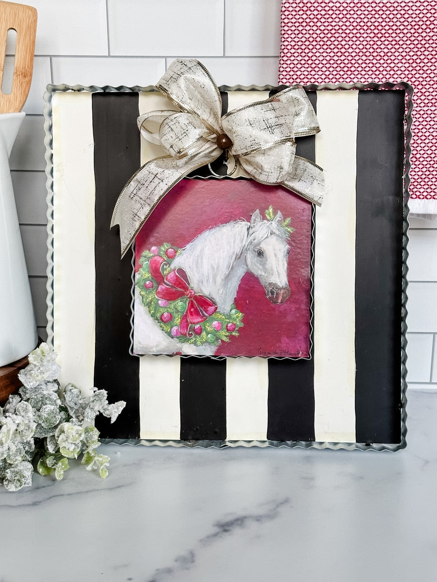 Black and white striped square mini gallery display board with a scalloped metal edge.