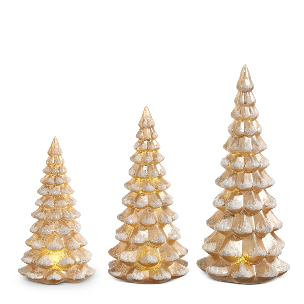 Three lighted antiqued champagne glass Christmas trees with glitter accents in varying sizes.