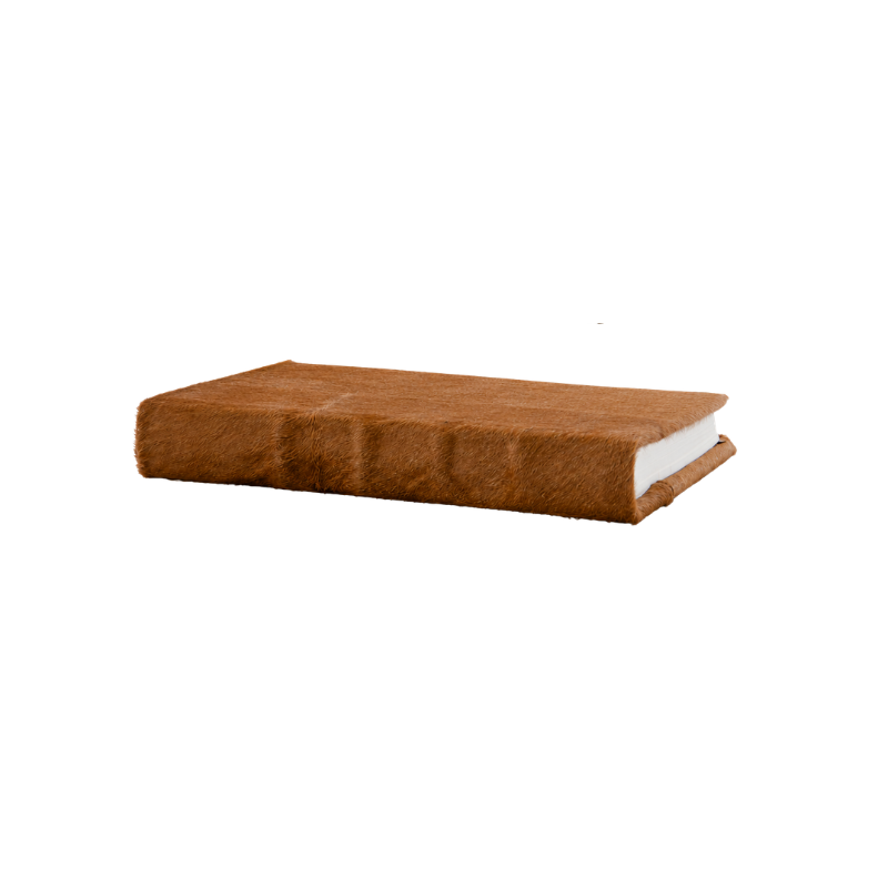 Tan hide journal with a textured brown fur-like cover and white unlined pages.