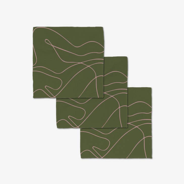 Set of waffle weave washcloths with single-sided prints featuring a hang loop.